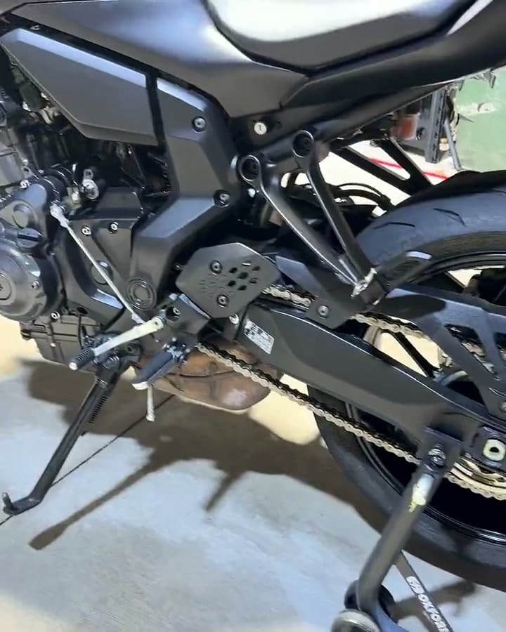 Matte grey Yamaha MT-07 on a paddock stand after a matte ceramic coating — flat, even finish along the tank and side panels